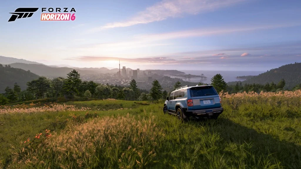 Forza Horizon 6 off-road SUV driving through grassy countryside fields in rural Japan during sunset